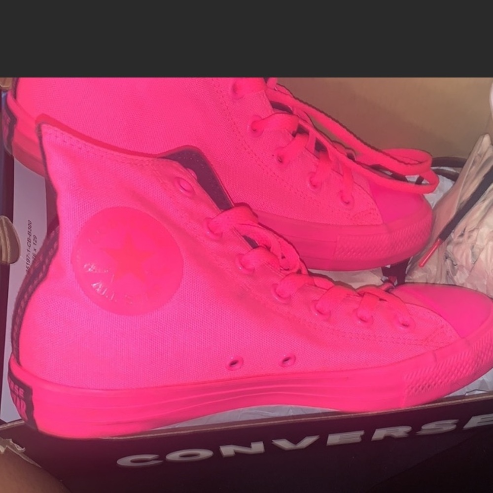 Pink converse. Worn a couple of times.